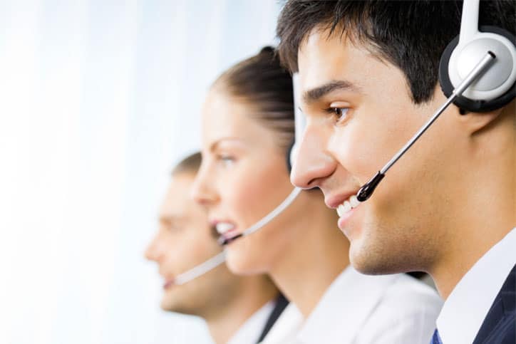 3 customer service agents in a call centre